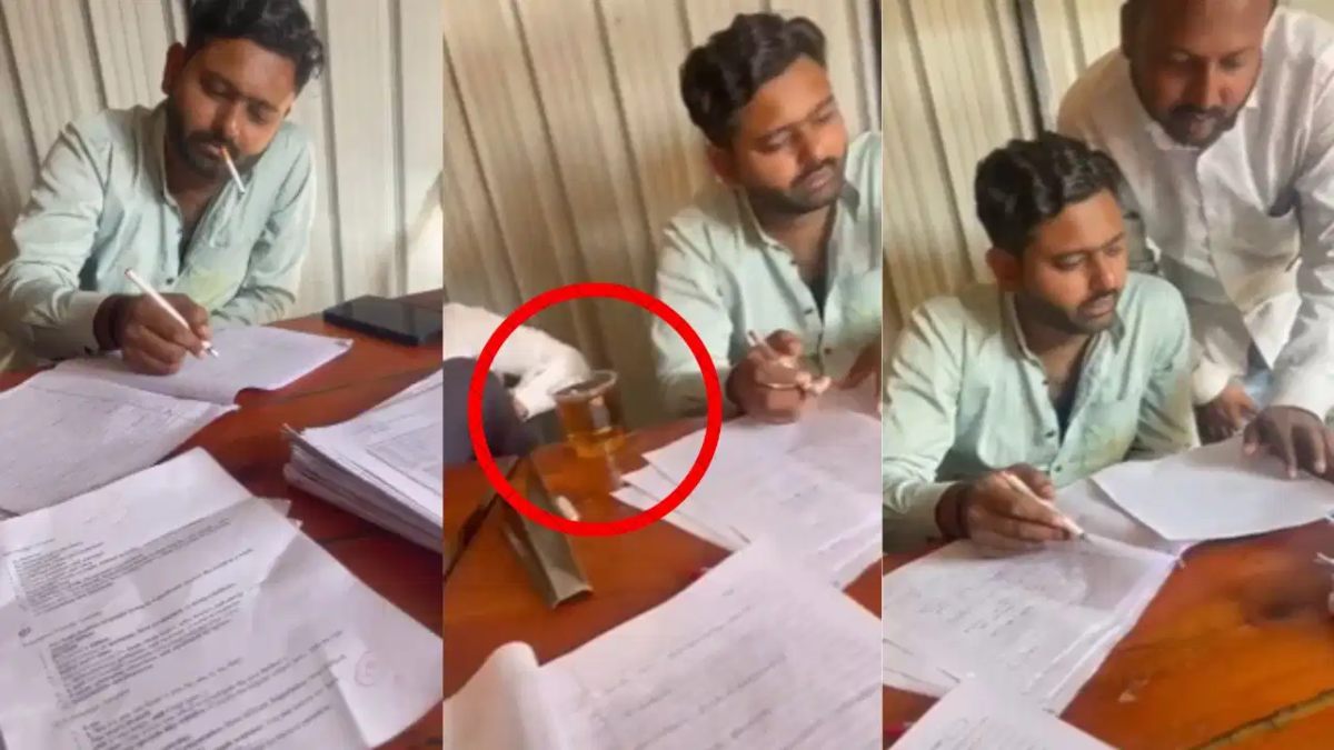 मुंह में सिरगेट, टेबल पर शराब और कॉपियों की चेकिंग…, शराब के नशे में धुत टीचर ने सिगरेट पीते हुए जांची बच्चों की कॉपियां
